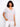 Vibrant heart-printed T-shirt showcasing a stylish V-neckline, perfect for casual outings by Charlie B.