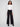 Black pants with a flattering wide-leg silhouette, offering both comfort and style for versatile wear, by Charlie B.