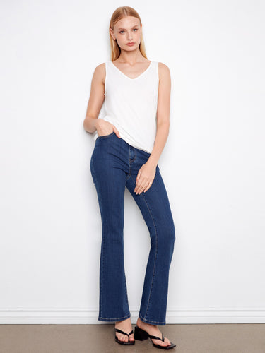 Stylish white top with reversible design, perfect for any casual outfit combination by Charlie B.