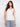 This top features a reversible design for versatile styling options, perfect for any occasion. By Charlie B.
