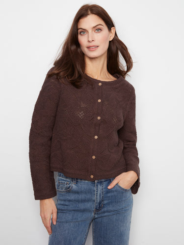 This stylish sweater features a classic crew neckline, perfect for any casual outing. Made from 100% cotton by Charlie B.