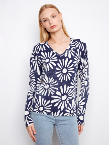 Navy blue and white sweater featuring a 100% cotton fabric with graphic floral pattern, perfect for casual outings by Charlie B.