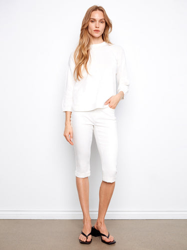 Elegant white sweater with a rounded hem and crafted from 100% cotton, perfect for any occasion by Charlie B.