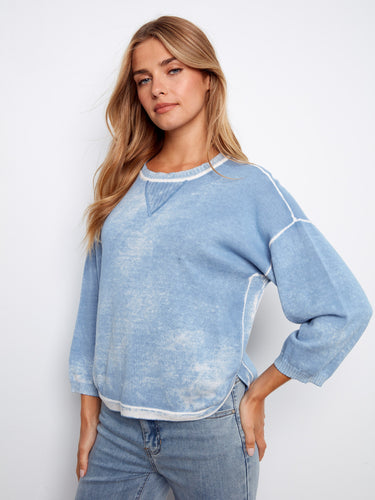 Stylish top with rounded hem, adding elegance to everyday looks. Made from pure cotton for comfort by Charlie B.