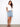 Denim skirt with front buttons, offering a stylish look and convenient wear. The short length adds a modern touch. By Charlie B.
