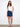 Indigo denim skort with a short length and five-pocket style, featuring a scalloped hem. Perfect for casual outings by Charlie B.