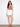 White skort with scalloped hem and stretch twill fabric, featuring button front by Charlie B.
