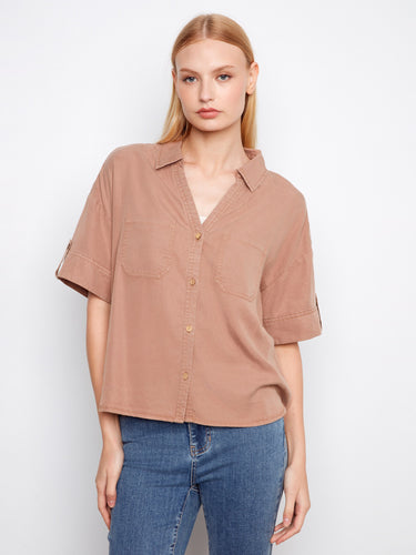 This stylish shirt features a classic shirt collar and chest pockets, perfect for both casual and formal occasions by Charlie B.
