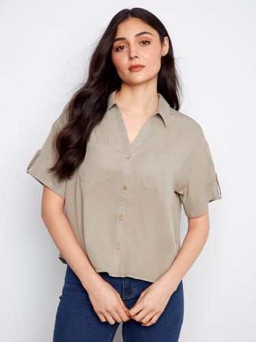 Casual shirt featuring a classic shirt collar and button-front design, perfect for versatile styling. By Charlie B.