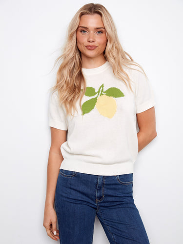 This stylish top features a classic crew neckline, perfect for any casual outing. Made from 100% cotton for comfort by Charlie B.