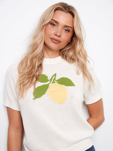 The top showcases raglan short sleeves, adding a unique touch to its design. Crafted from soft cotton material by Charlie B.