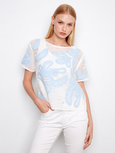 White crochet sweater with a relaxed fit, featuring a leaves pattern and short sleeves for casual elegance by Charlie B.