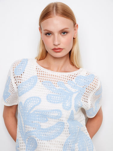 Crochet sweater in white with intricate leaves pattern and comfortable short sleeves by Charlie B.