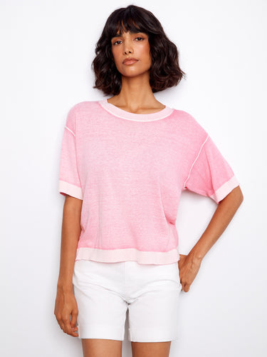 Pink relaxed fit top in 100% cotton, featuring a classic crew neck design. By Charlie B.