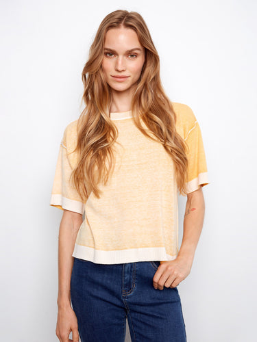 This top features a stylish crew neck design, perfect for casual outings. Made with 100% cotton for ultimate comfort by Charlie B.