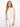 Natural linen-blend top with a stylish crew neckline and elegant sleeveless design, perfect for warm days by Charlie B.