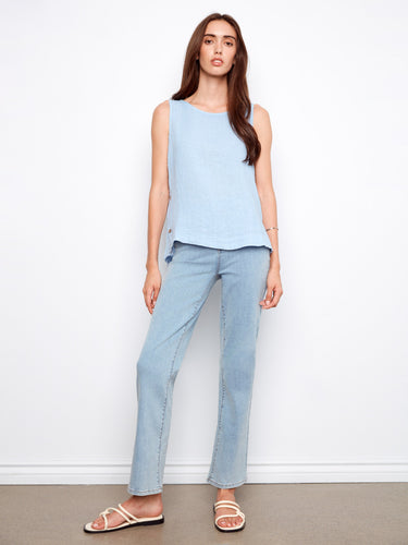 Chic high-low hem top in soft blue, offering a relaxed fit and versatile style for any casual outing. By Charlie B.