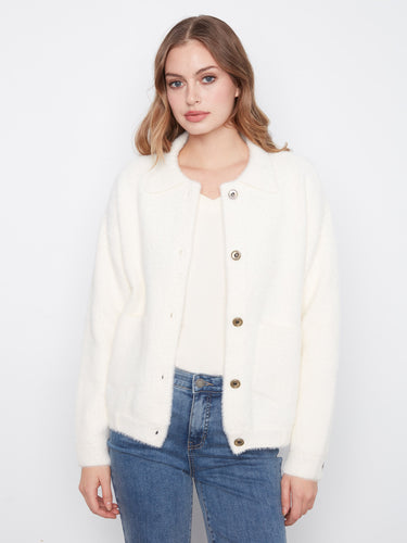 Cozy jacket with a classic shirt collar and button-front closure, perfect for layering. By Charlie B.