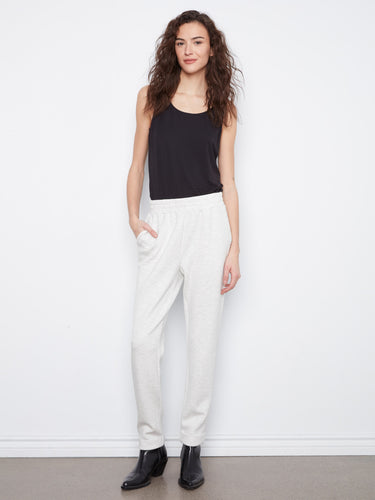 Heather-light grey jogger pants featuring a tapered fit and elastic waistband, perfect for casual wear by Charlie B.