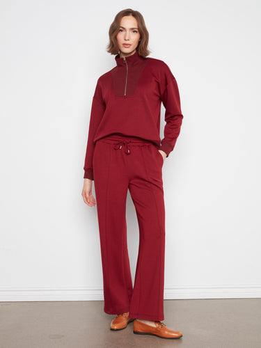 These pants feature a chic wide leg design, offering both style and comfort. Perfect for any casual outing by Charlie B.