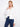 White denim jacket with a classic shirt collar and button front, perfect for layering by Charlie B.