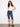 Woman in indigo pedal pushers featuring a regular rise and slim fit, perfect for casual outings by Charlie B.