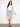 Denim skirt with a regular rise and classic design, featuring five pockets for convenience. By Charlie B.