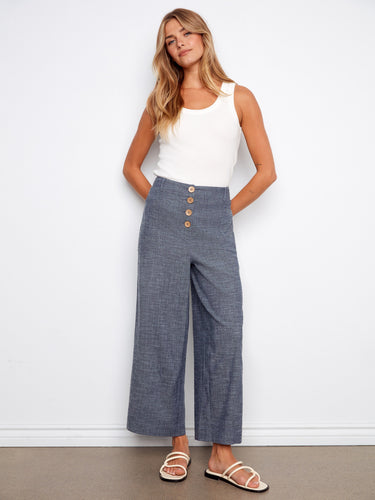 Indigo pants featuring a wide leg fit and button front, crafted from stretch linen for comfort by Charlie B.