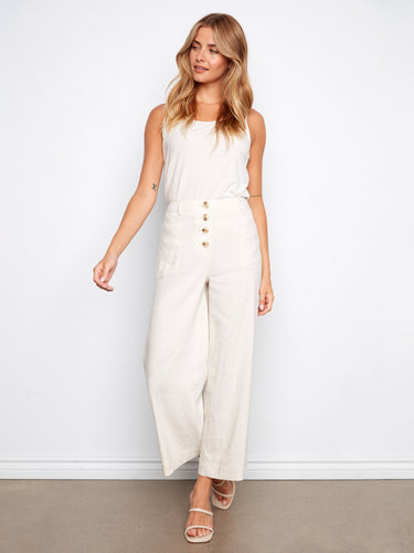 These pants feature a wide leg fit, offering a relaxed and stylish silhouette for any occasion by Charlie B.