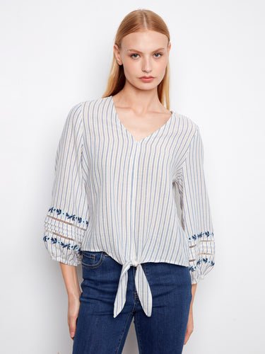 Elegant striped blouse with intricate embroidery on sleeves, crafted from 100% cotton by Charlie B.