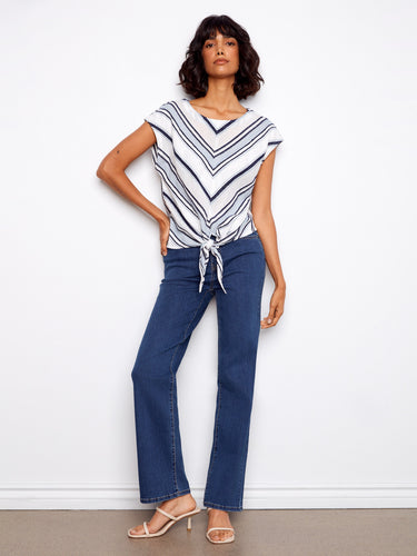 The front hem tie adds a playful touch to this top, making it versatile for casual outings or dressier occasions by Charlie B.