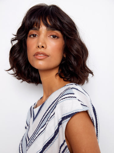 Cap sleeves provide a relaxed fit that enhances the overall style of this 100% cotton top, perfect for warm weather by Charlie B.