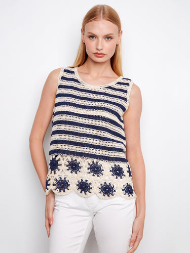 Navy and cream striped crochet top featuring a crew neckline, highlighted with floral hem detailing by Charlie B.