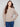 Stylish heather taupe sweater with front seam detail, combining simplicity and elegance effortlessly by Charlie B.