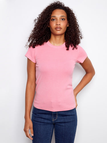 Pink semi-fitted top with a ribbed texture, accentuating a stylish crew neck design. Perfect for casual outings by Charlie B.