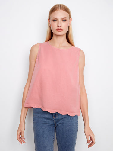 Featuring a classic crew neckline, this pink top offers timeless style and versatility. By Charlie B.