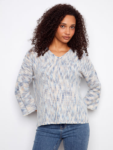 Mist-colored sweater featuring a drop shoulder design, enhancing its relaxed fit and style by Charlie B.