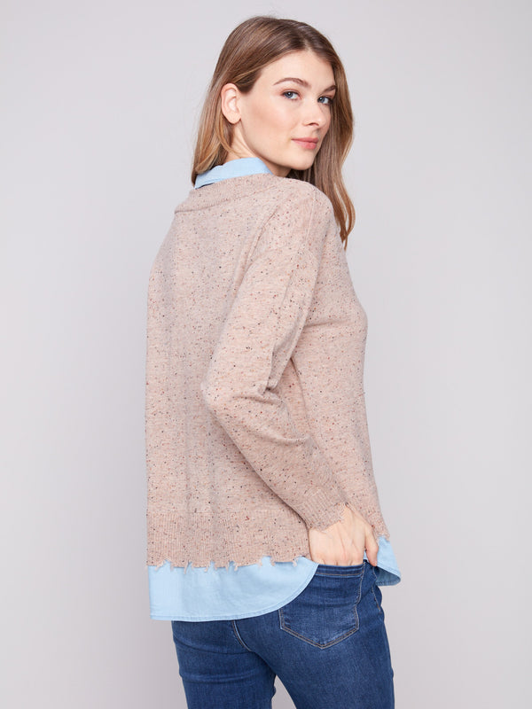 Elegant oat flecks sweater showcasing a unique layered design with poplin shirt collar detail by Charlie B.
