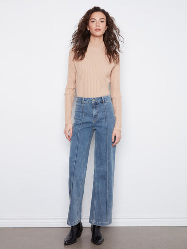 Denim jeans featuring an extra-wide leg for a relaxed fit, perfect for all-day comfort. By Charlie B.