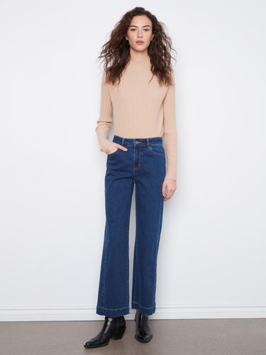 These jeans feature a chic wide leg design, perfect for a modern wardrobe update. Crafted with care by Charlie B.