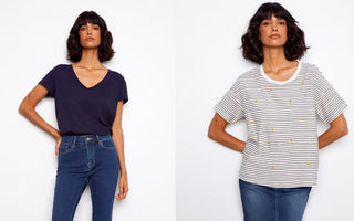 Woman wearing a navy V-neck t-shirt on the left and a white and navy striped tee with embroidered yellow flowers on the right, both paired with medium-wash blue jeans.