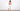 A woman wears the best capri pants for women in white denim, styled with a mauve tank top and nude heeled sandals