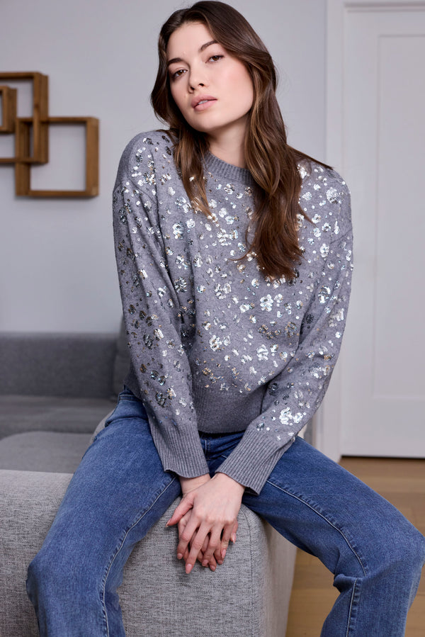 Stylish heather grey sweater featuring shimmering sequins and comfortable drop shoulders by Charlie B.