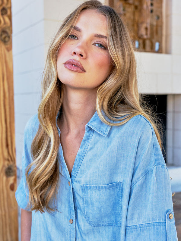 Tencel desert blouse showcasing chest pockets and elegant button tabs on sleeves by Charlie B.