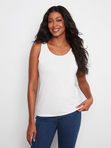 This white tank top features a scoop neckline, offering a classic and versatile look for any wardrobe. By Charlie B.