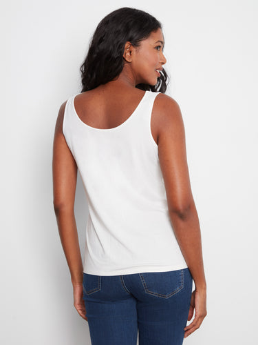 Stay cool with the sleeveless cut of this essential white tank top by Charlie B.