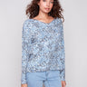 Blue knit top with relaxed fit and ditsy print, perfect for casual wear by Charlie B.
