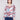 Pink tie-dye knit top featuring a relaxed fit with a V-neck design, perfect for casual wear by Charlie B.