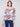 Pink tie-dye knit top featuring a relaxed fit with a V-neck design, perfect for casual wear by Charlie B.
