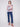 Trendy V-neck pink knit top with long sleeves and vibrant tie-dye design, great for layering by Charlie B.